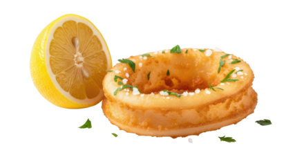 Golden fried calamari rings with fresh lemon slice and parsley garnish on black background squid rings