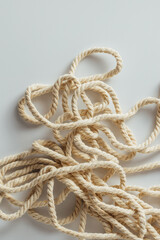 Twisted Natural Rope on White Background for Craft and Design Projects