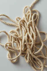 Twisted Natural Rope on Soft White Surface for Design Use