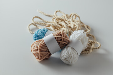Soft Yarn Spools and Twine on a Neutral Background for Crafts