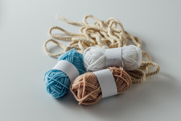 Colorful Yarn and Twine on White Background for Crafting Projects