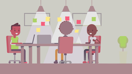 Team of startup founders discussing business strategy at office meeting table with laptops