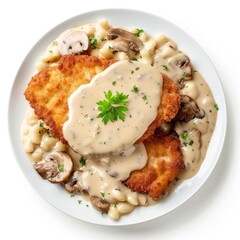 Breaded pork cutlets, covered in creamy mushroom sauce, served with shell pasta and mushrooms, garnished with fresh parsley