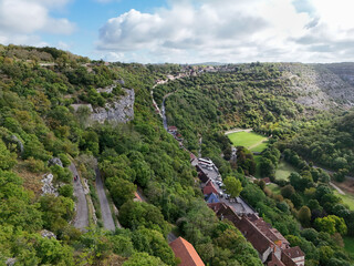 Village of Rocamadour in France, perched on a cliff in a valley 