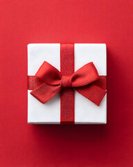 Joyful holiday celebration top view of gift-packed surprises on red background