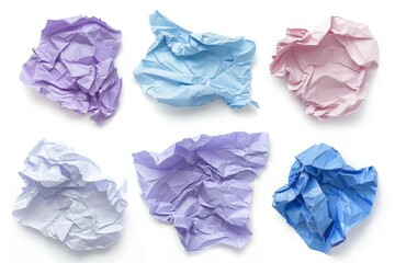 Crumpled sheets of colorful paper on a white background represent discarded ideas, mistakes, or creative block