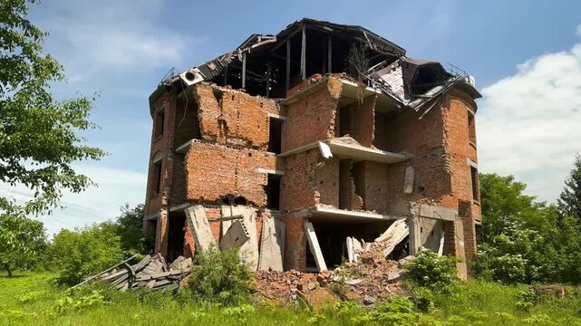 A strange house-palace in Ukraine, forgotten and crumbling, as if during a military bombing in war. The owner is missing, the property abandoned.