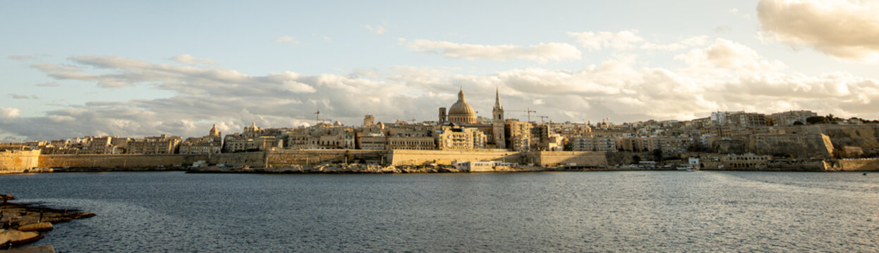 Breathtaking skyline view of Valletta from Sliema at sunset