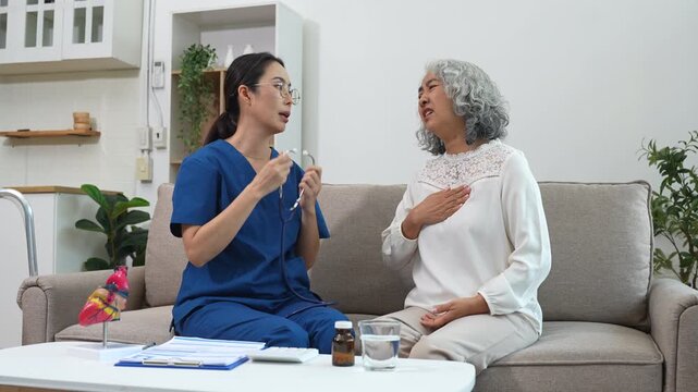 Medical concept.doctor listens to patient's heartbeat using a stethoscope during a health check.