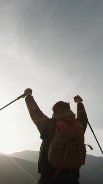 epic cinematic mountain sunrise slow motion man victory pose low angle shot travel footage