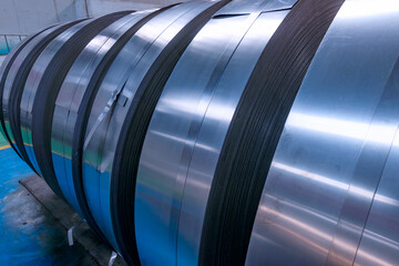 Obraz premium Close up of hot-rolled steel coils and strips, metal sheet industry