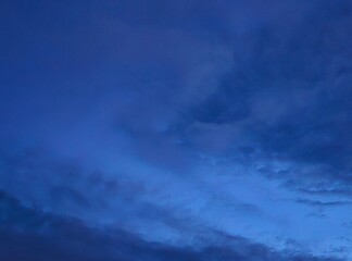 Obraz premium storm clouds timelapseDark blue afternoon sky with grey clouds.Dark blue sky in evening after sundown