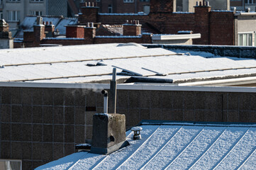 Rooftops and terraces covered with snow, high angle view of Jette, brussels Capital Region, Belgium.