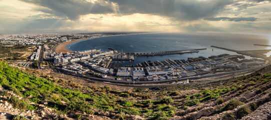 Panoramic View Over a Coastal Harbor Town With Marina, Beach, and Hillside, Agadir, Morocco