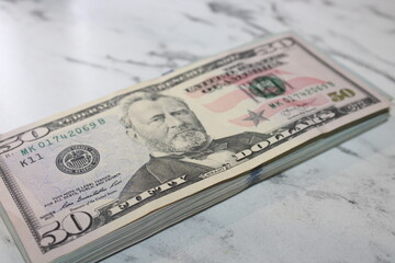 Stack of Fifty US Dollar Bills, Close-Up of Cash Money Pile, Financial Concept