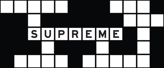 Alphabet letter in word supreme on crossword puzzle background