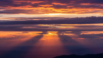 Dramatic Sunset Clouds with Vibrant Orange, Pink and Purple Sky in Cinematic Evening Light