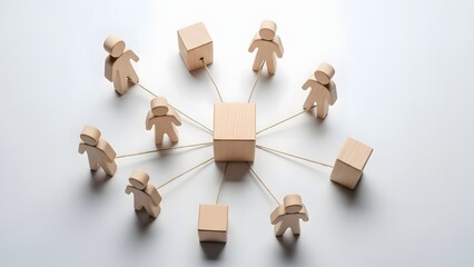 Conceptual representation of teamwork and collaboration through wooden figures connected to a central cube, symbolizing network and synergy