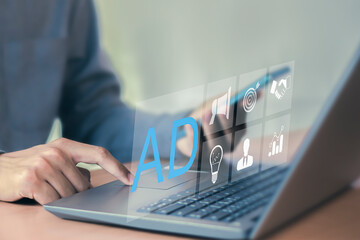 Online sales concept for digital marketing. Businessman using laptop with advertising dashboard.