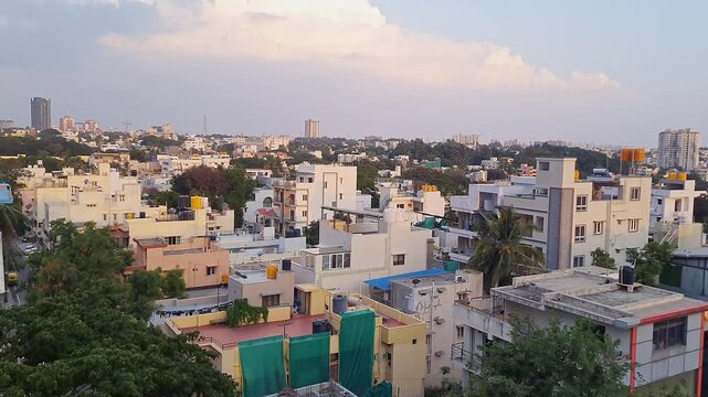 A wide view of Bangalore city streets and office or residential buildings during winter morning