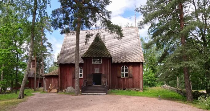 Karuna wooden church, oldest building inSeurasaari, from Sauvo at Seurasaari Open-Air Museum in summer, Helsinki, Finland.