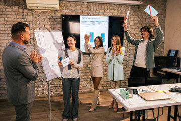 Happy Businesswoman Holding Bonus Envelope