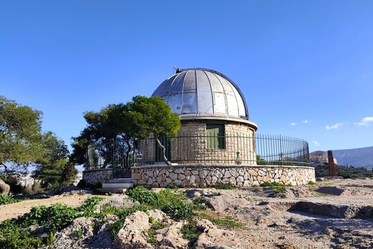 Exterior view of the historic Doridis Telescope on Nymphs Hill. This refracting telescope is named after Dimitrios Doridis, who funded its construction in 1902.