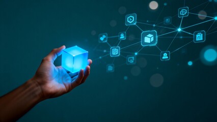 Hand holding glowing cube with network icons