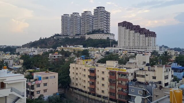 Wide shot of the tata promont residential tower situated on a hilltop at the Bangalore outskirts