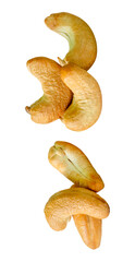 A set of six roasted or baked cashew nuts in two heaps isolated on white background with clipping path.