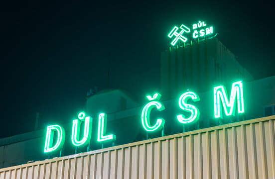 The neon signs of the CSM Sever coal mine in Stonava owned by OKD, at the night.