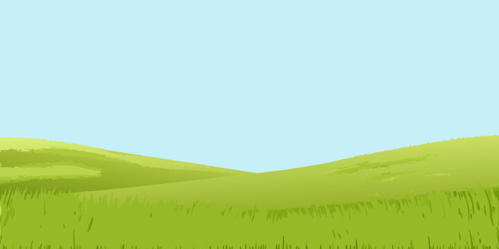 Simple landscape with green hills and a clear blue sky backdrop