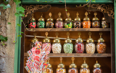 Jars with different delicious candies