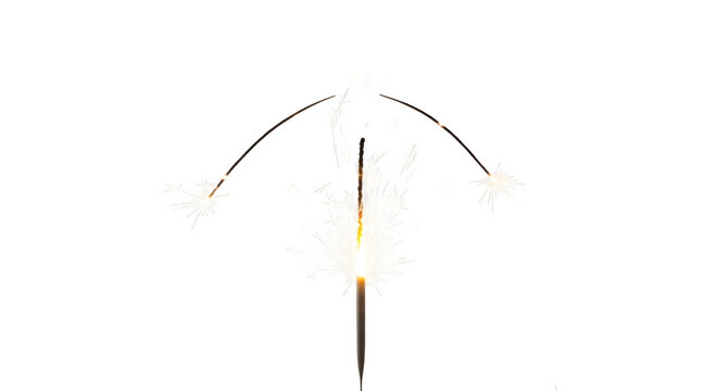 Sparkler fireworks exploding with bright png isolated transparent background white sparks against a black background