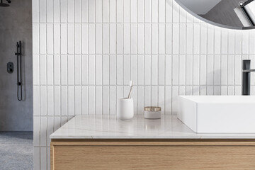 Minimalistic bathroom featuring a marble basin with black faucet and mirror, flower . This mockup-ready countertop can serve as a display stand for bathroom products 3d Rendering