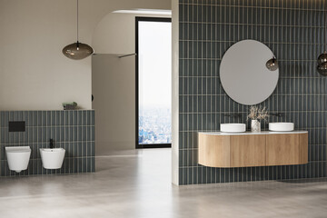 Modern bathroom interior with beige and green tiles wall, concrete floor, wooden vanity with black sink and oval mirror, toilet, shower. 3d Rendering