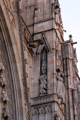 Statues on the exterior facade of Barcelona Cathedral in the Gothic Quarter, taken in July 2024.