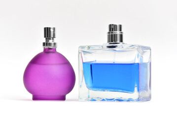 Perfumes glass jars on a white background.