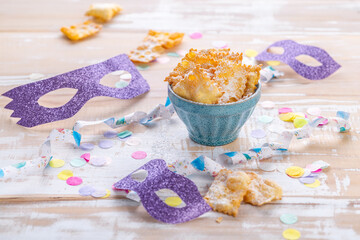 Carnival and party snack with confetti, ribbon and party accessories