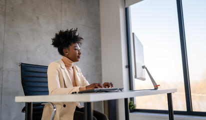Smiling successful business woman, freelancer, coworker female leader using digital device, phone