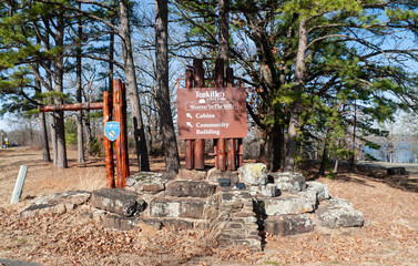 Tenkiller State Park, Oklahoma, Tenkiller Lake and Dam entrance with community center and cabins signage.