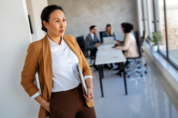 Business team having a meeting in office and solving problem. Teamwork, people and crisis concept.