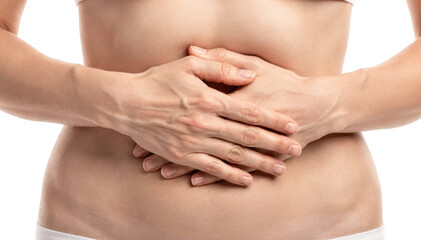 Closeup of hands resting on abdomen during slow mindful breathing practice aimed at reducing respiratory rate showing relaxation and breath awareness on white background.