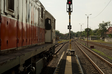 Railway Infrastructure Featuring Locomotive and Diverging Tracks