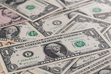 US Dollar Banknotes Scattered on Surface