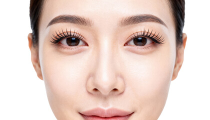 Obraz premium Frontal closeup of an adults clean face highlighting healthy eyelids and long lashes against a bright white background emphasizing skincare and eye health maintenance.