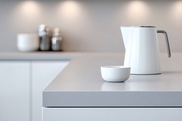 White minimalist kettle and bowl sitting on a modern kitchen countertop, clean aesthetic and functional design