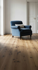 Blue velvet armchair with beige cushion on light oak wood floor, near white door. Showcase of interior design, comfort, and relaxation