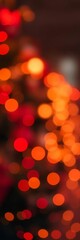 Obraz premium Soft focus red and gold bokeh lights create a warm and inviting holiday glow, bokeh, abstract