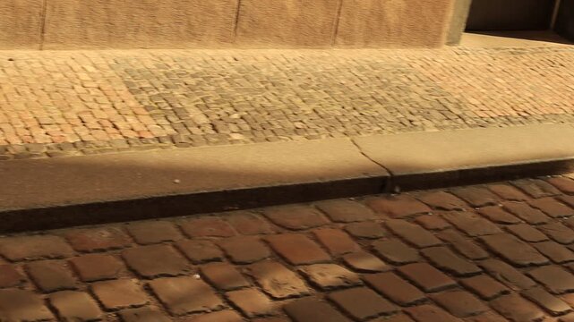 Old flagstone road and sidewalk in Prague